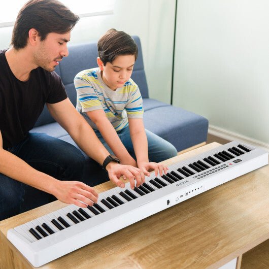 Costway 88 Key Foldable Electric Keyboard Piano with Wireless MIDI and Dual Speakers White - Galactic capuchin